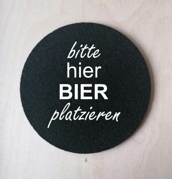Glasuntersetzer hier bier platzieren